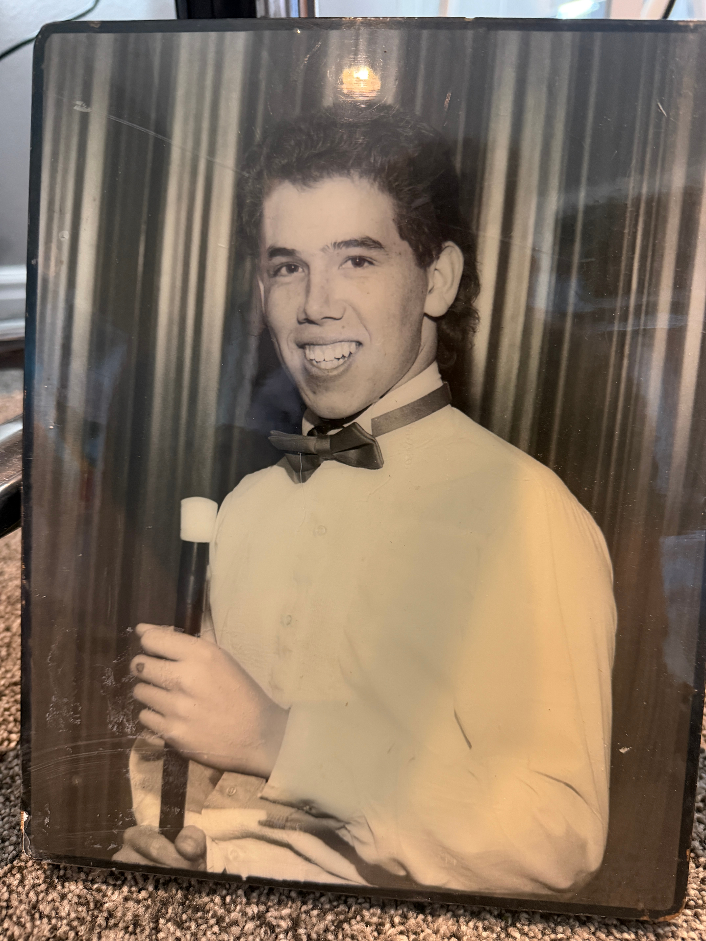 Tres the Great as a young boy with bow tie and magic wand