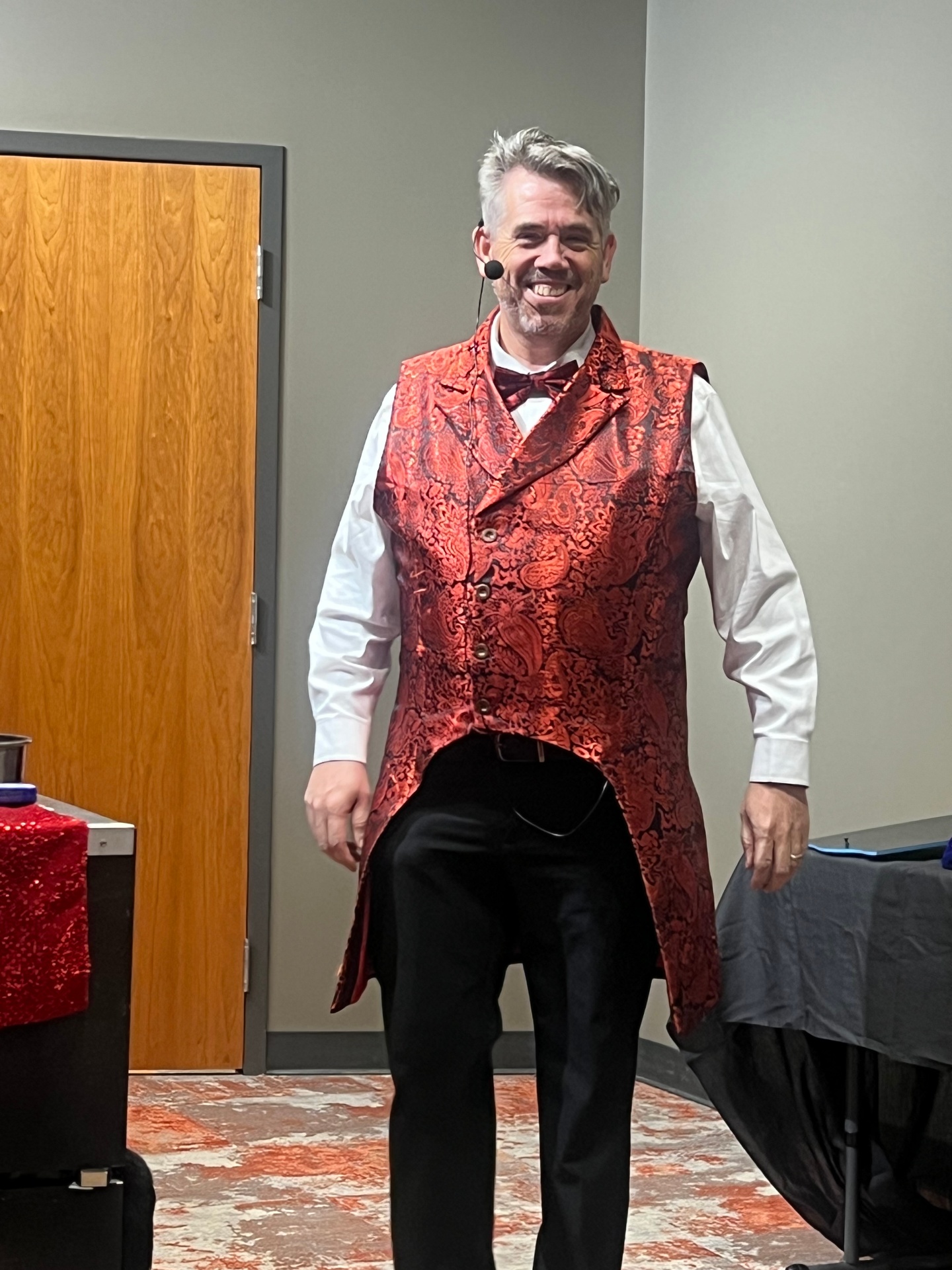 Tres the Great on stage in his signature red paisley vest